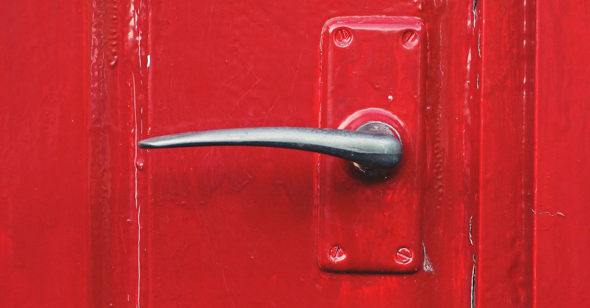 locksmith unlocking front door — Jamaica Locksmith Queens